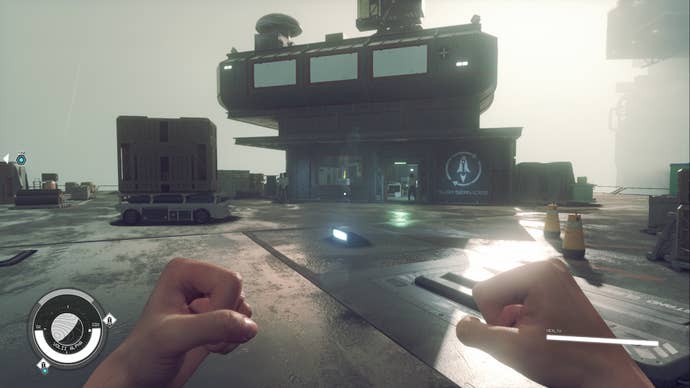 starfield first person pov of neon ship services building