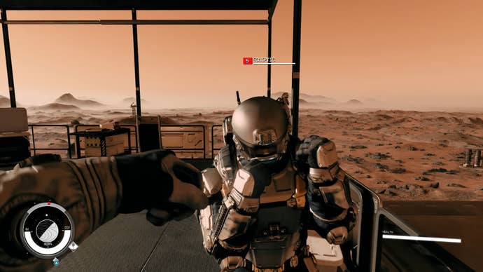 The player in Starfield has a fist fight with an enemy NPC on top of an outdoor platform.