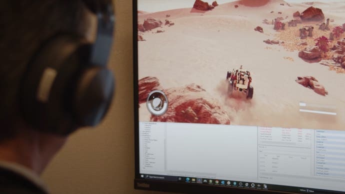 An image showing a Bethesda developer at their computer working on Starfield's land vehicles.
