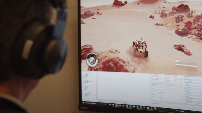 An image showing a Bethesda developer at their computer working on Starfield’s land vehicles.