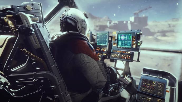 A character pilots a ship in Starfield.