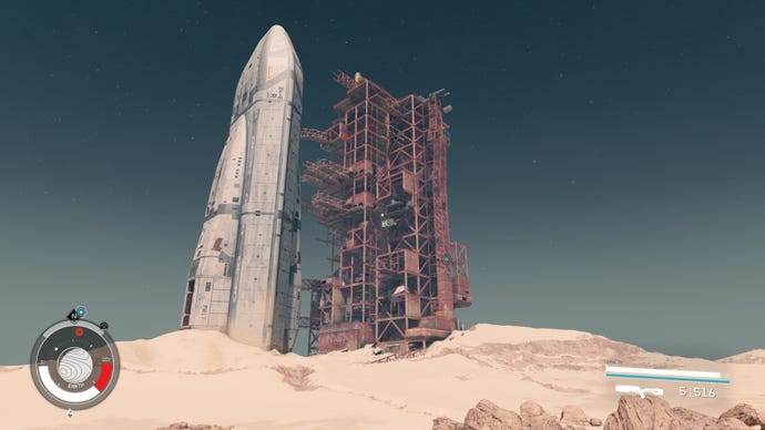 The NASA Launch Tower lays abandoned in a desert landscape on Earth in Starfield.