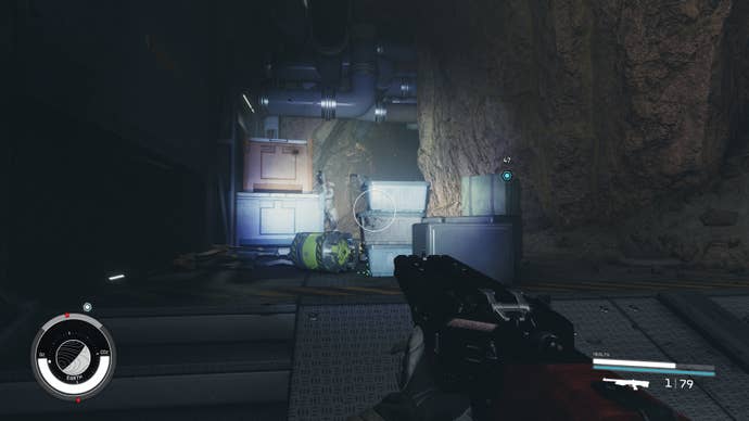 A Starborn hides behind a container waiting to attack the player existing NASA in Starfield.