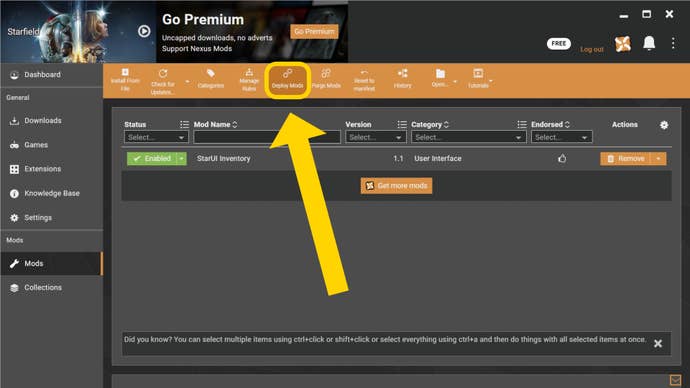 The Vortex Mod Manager mods menu, with an arrow highlighting the Deploy Mods button.