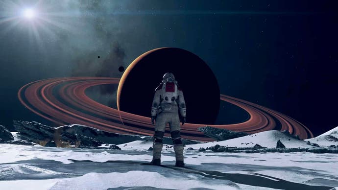 The player character posing against a shot of a ringed gas giant in Bethesda's open world RPG Starfield.