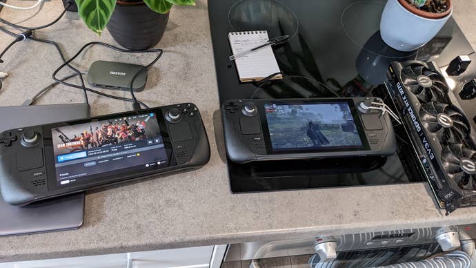 Two Steam Decks, one recharging and the other running a battery benchmark with Elden Ring.