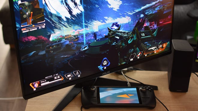 The Steam Deck running Apex Legends on a desktop monitor.