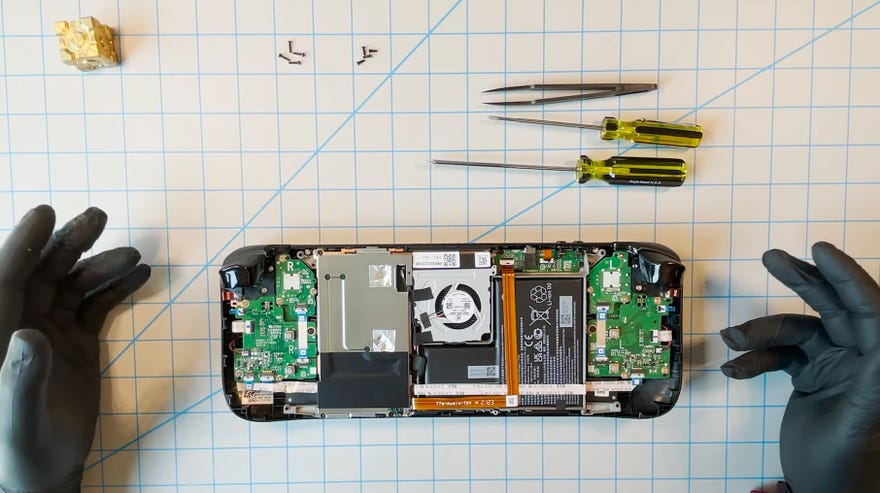 Steam Deck - a view of the interior of the Steam Deck with its rear case plate removed.