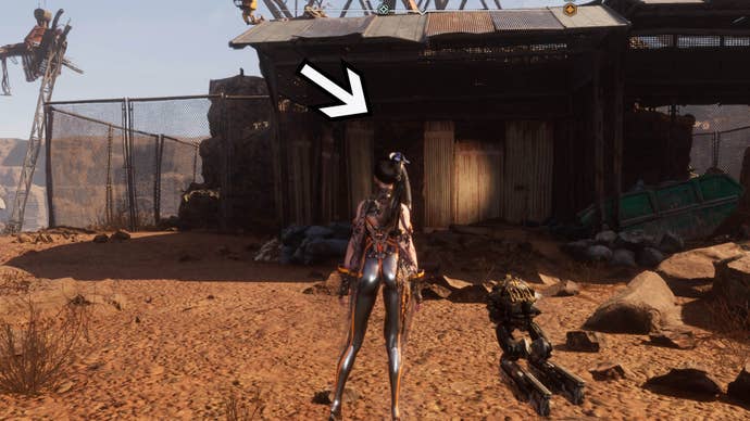 stellar blade entrance doorway to kayas bike in scrap plains