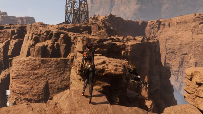 stellar blade eve facing stepping stone cliffs to arins location in wasteland