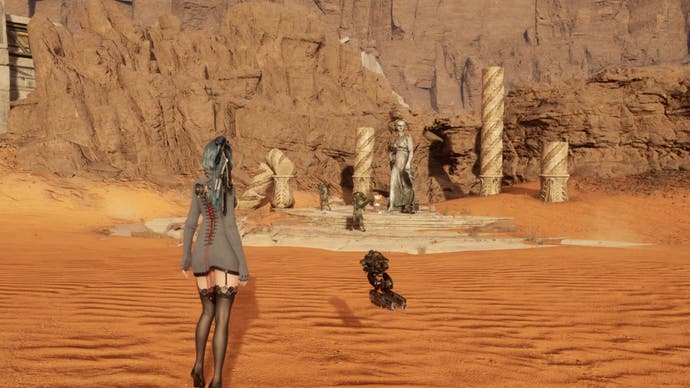 stellar blade eve facing the three witches statue in great desert