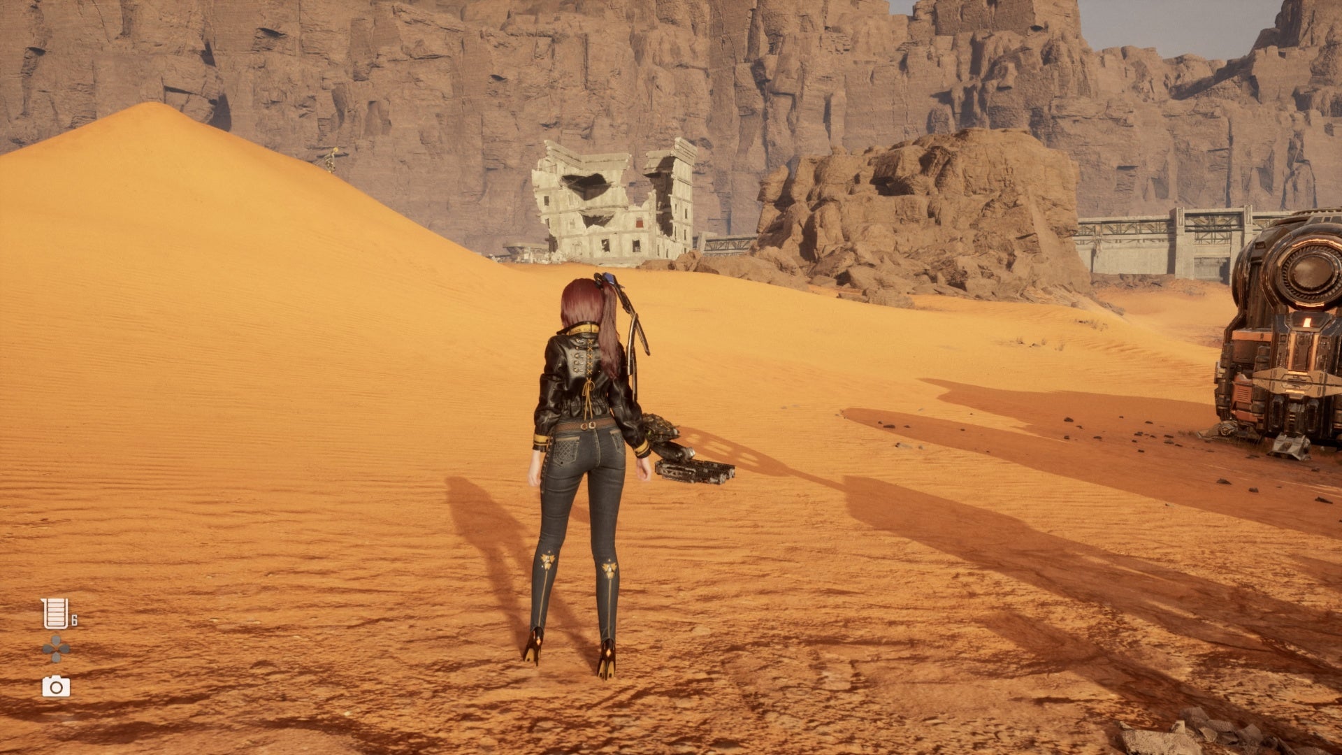 stellar blade great desert crumbling building with stellar tear in it