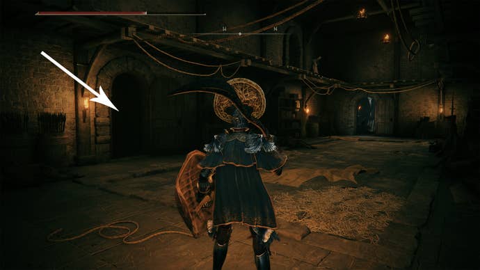 A doorway leading to a higher platform in Elden Ring’s Stormveil Castle.