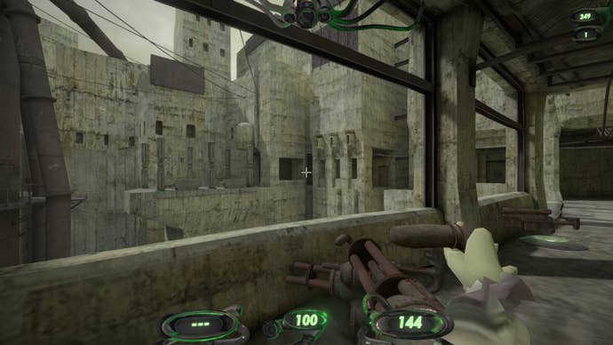 A grey city, viewed through a glassless window, concrete texture mis-aligned and stretched over every surface.