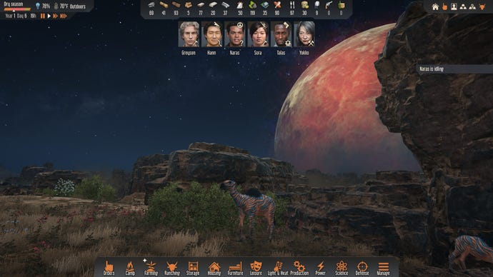 A beautiful red moon peaks out behind a cliff face in in Stranded Alien Dawn
