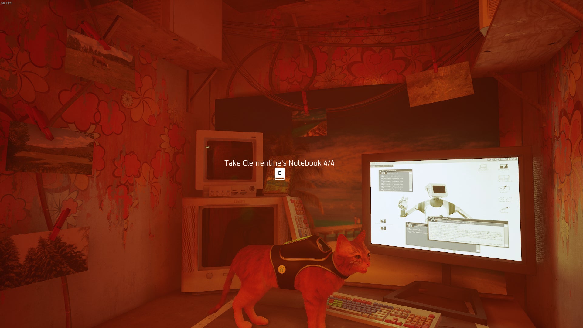 The cat of Stray looks at Clementine's notebook. - 6