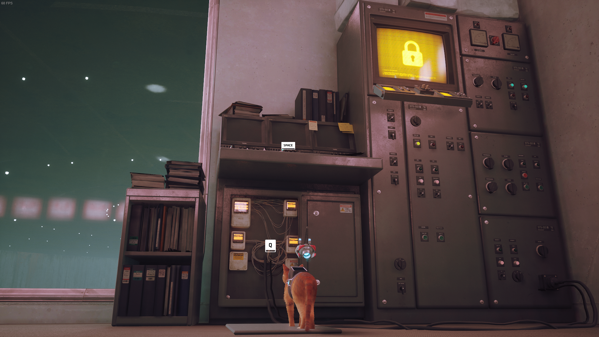 The cat of Stray looks at a computer tower.