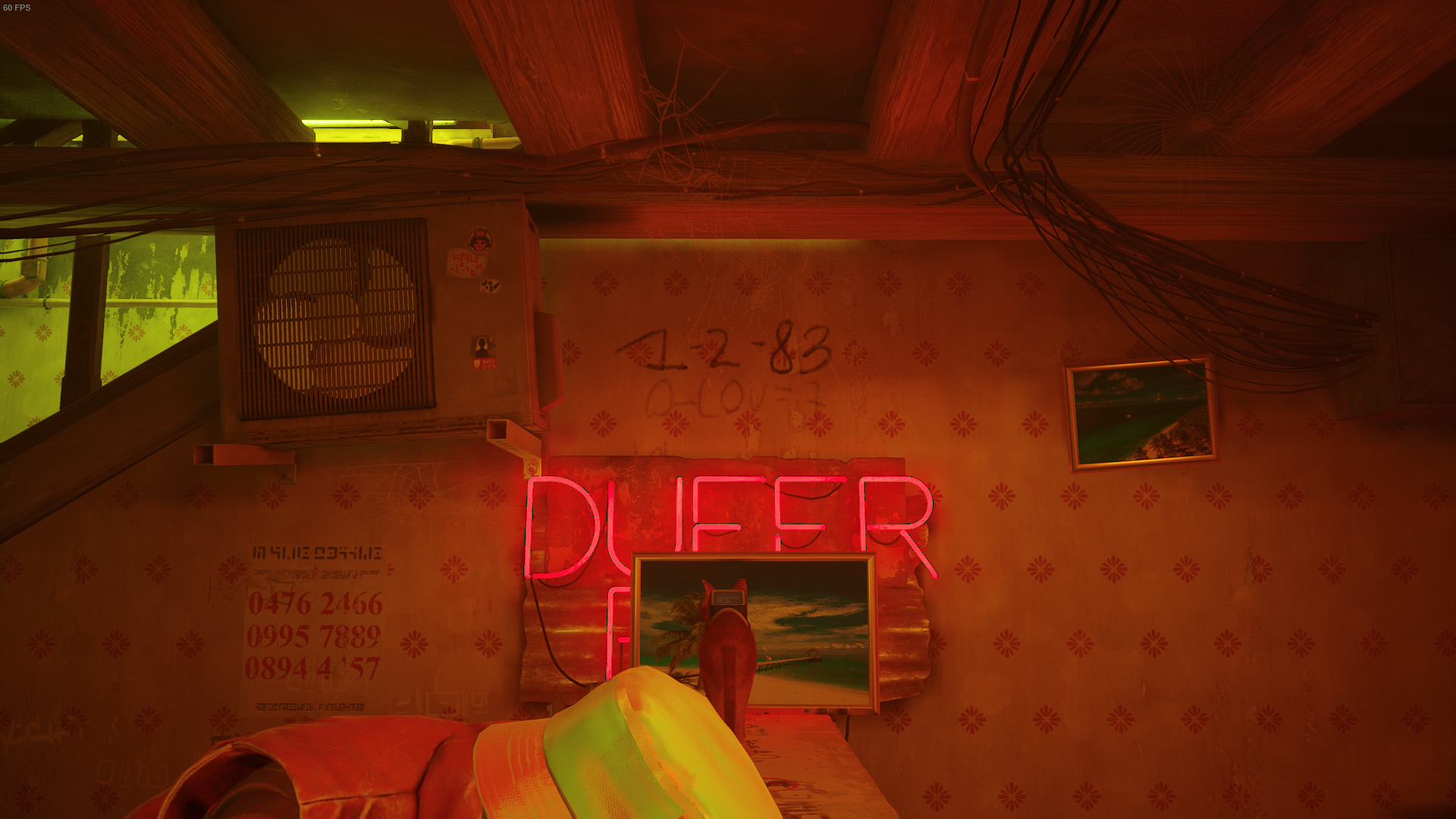 The cat of Stray looks at a code on the wall of Dufer Bar after knocking a painting down.