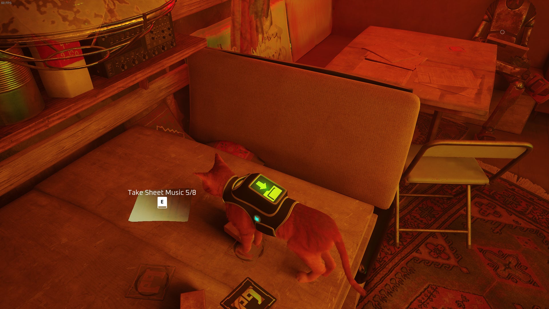 The Outsider looks at a piece of sheet music on an upstairs table in the Dufer Bar of Stray. - 9