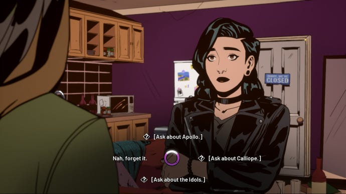 A woman with black hair and black clothes talks to a friend inside an apartment in Stray Gods: The Roleplaying Musical