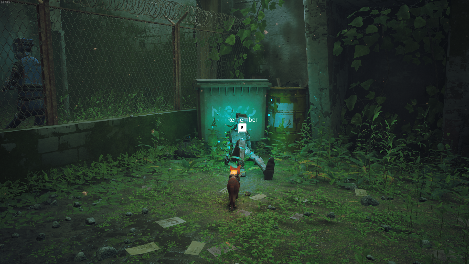 The cat of Stray looks at a deceased robot in the Jail.