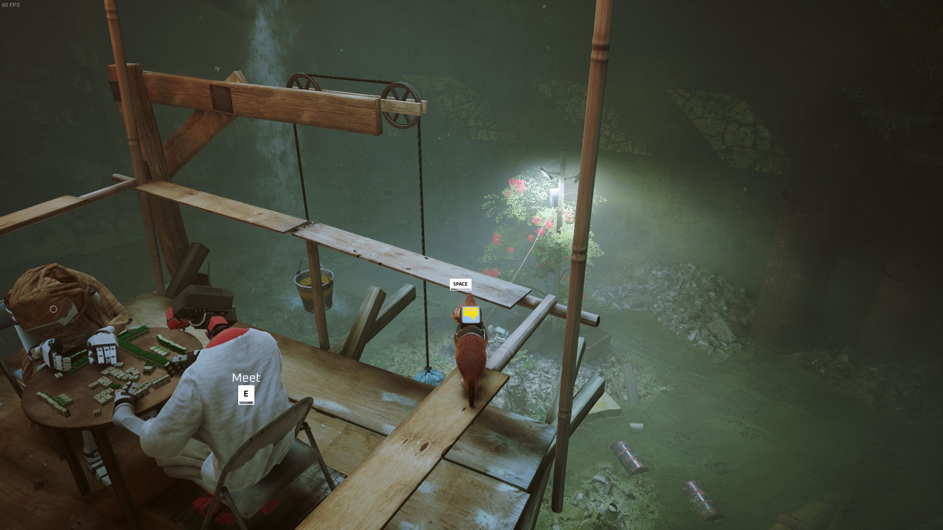 The cat of Stray looks down at a tree adorned with red flowers while two robots play Mahjong beside them. - 10