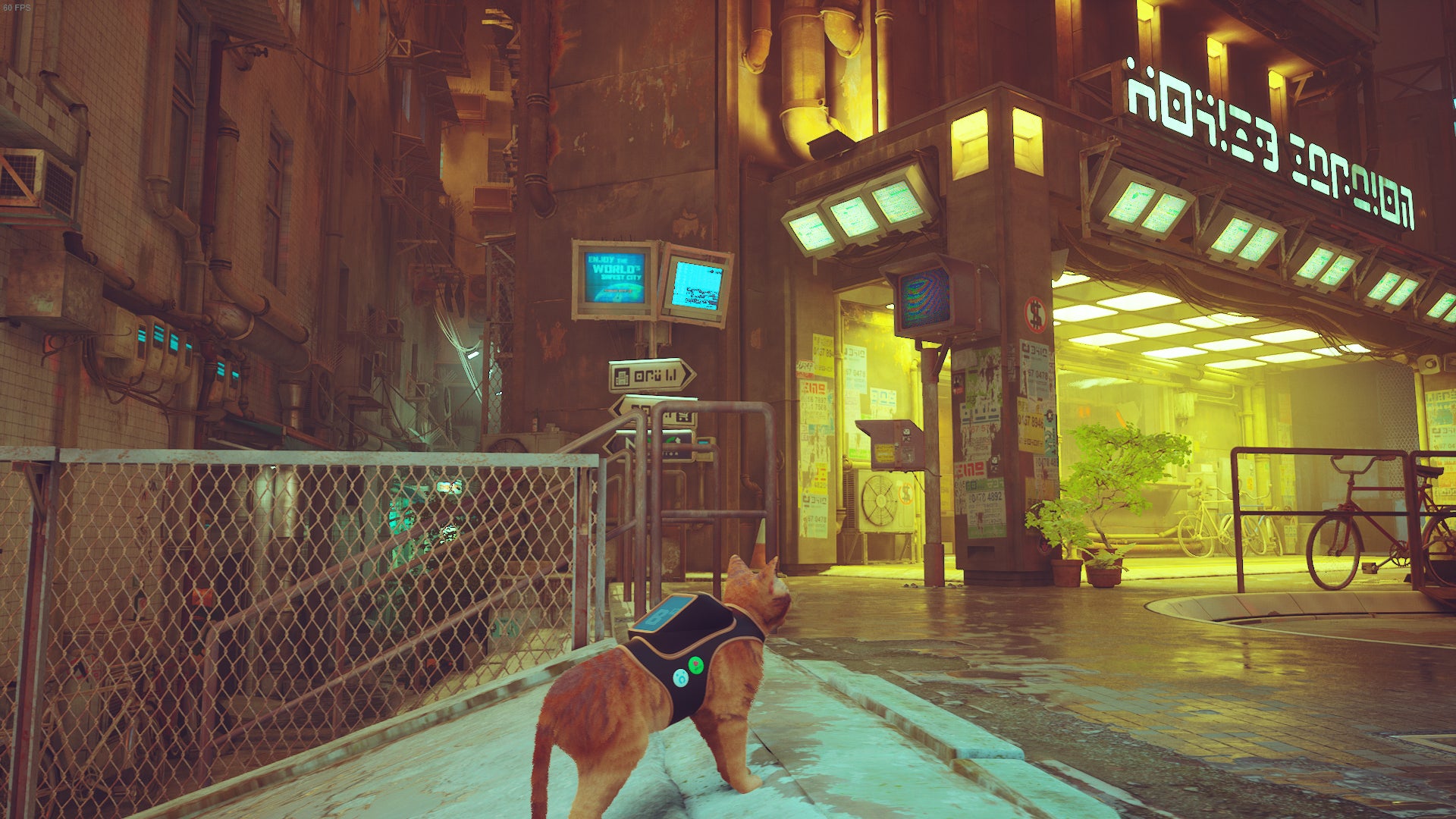 The cat of Stray faces Midtown's security station, with the alley beside it on show. - 13