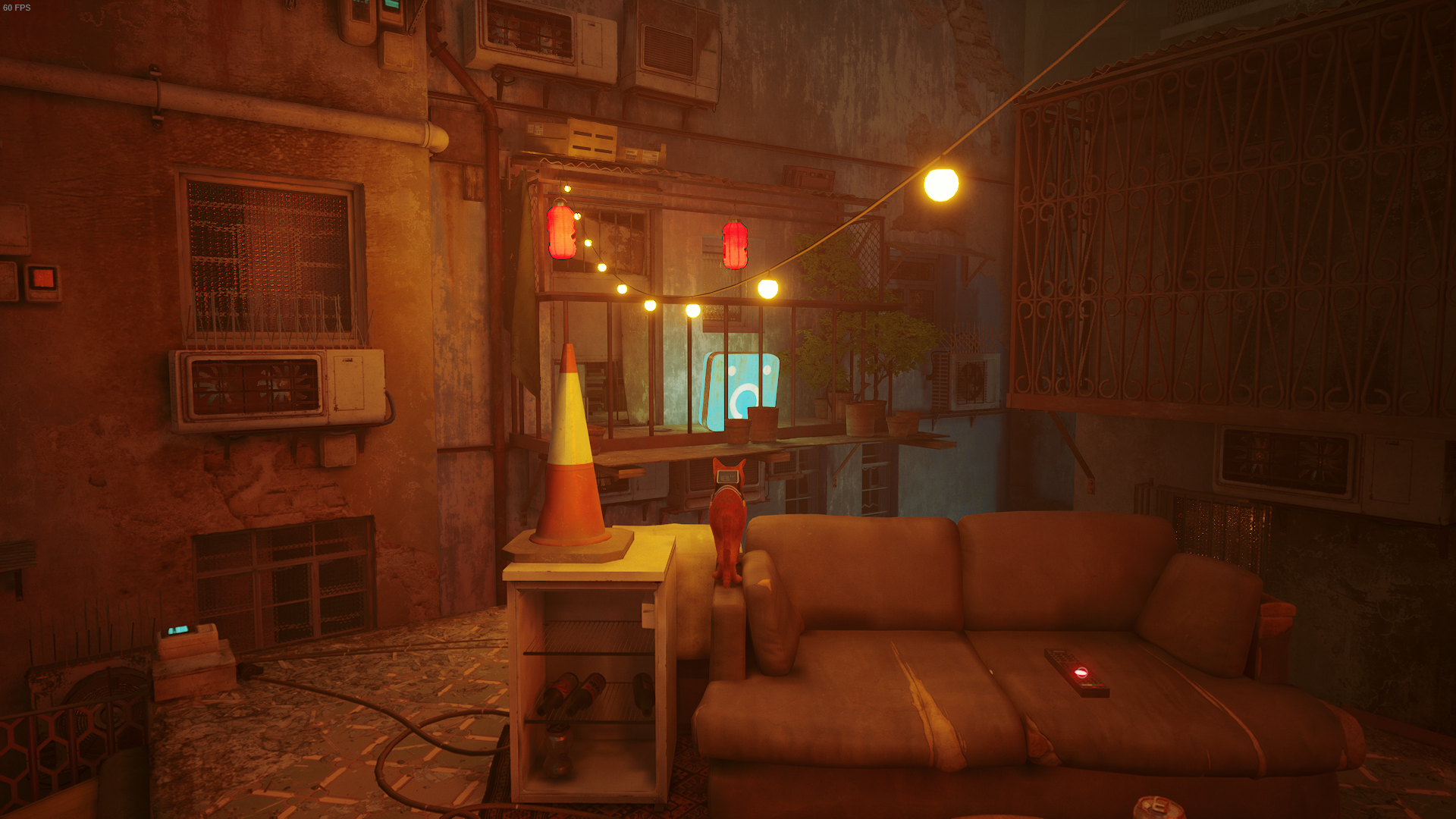 The cat of Stray stands on a sofa, on the rooftops, while looking in the direction of Doc&rsquo;s flat.