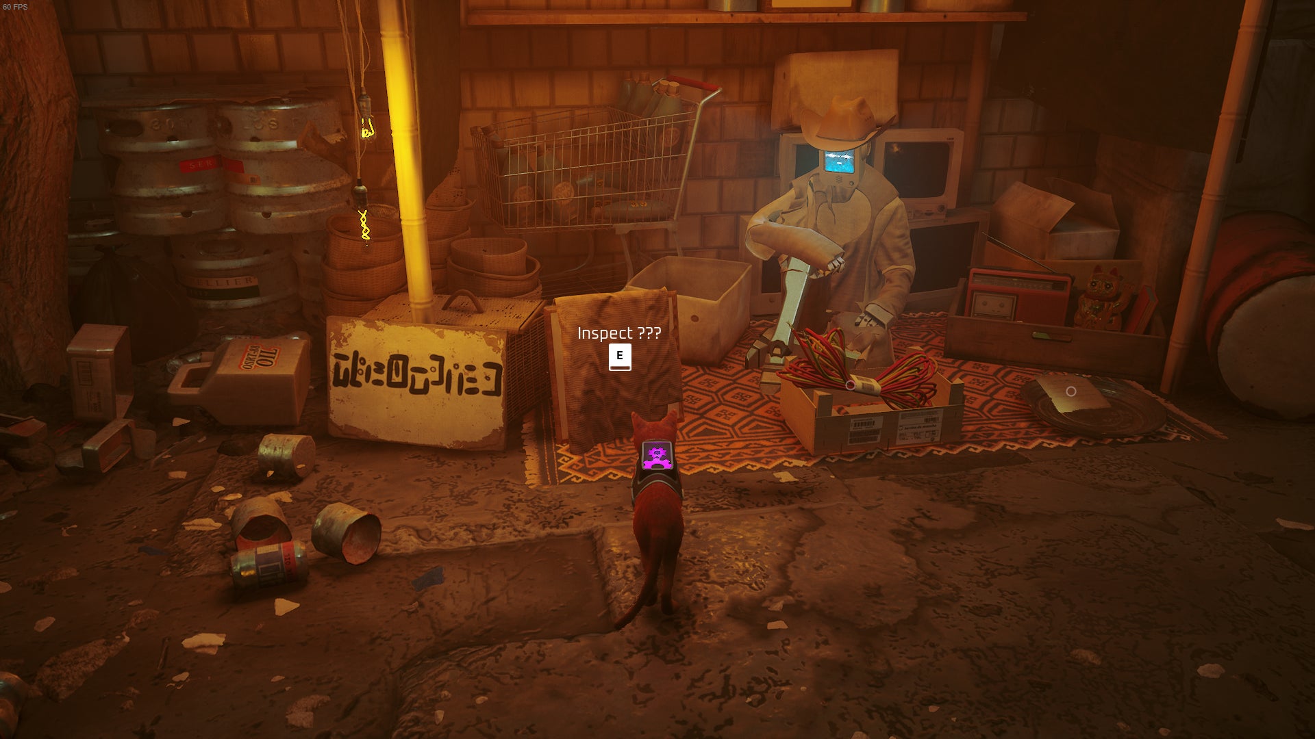 The cat looks at a relic, a memory, being sold by Azuz in Stray. - 8