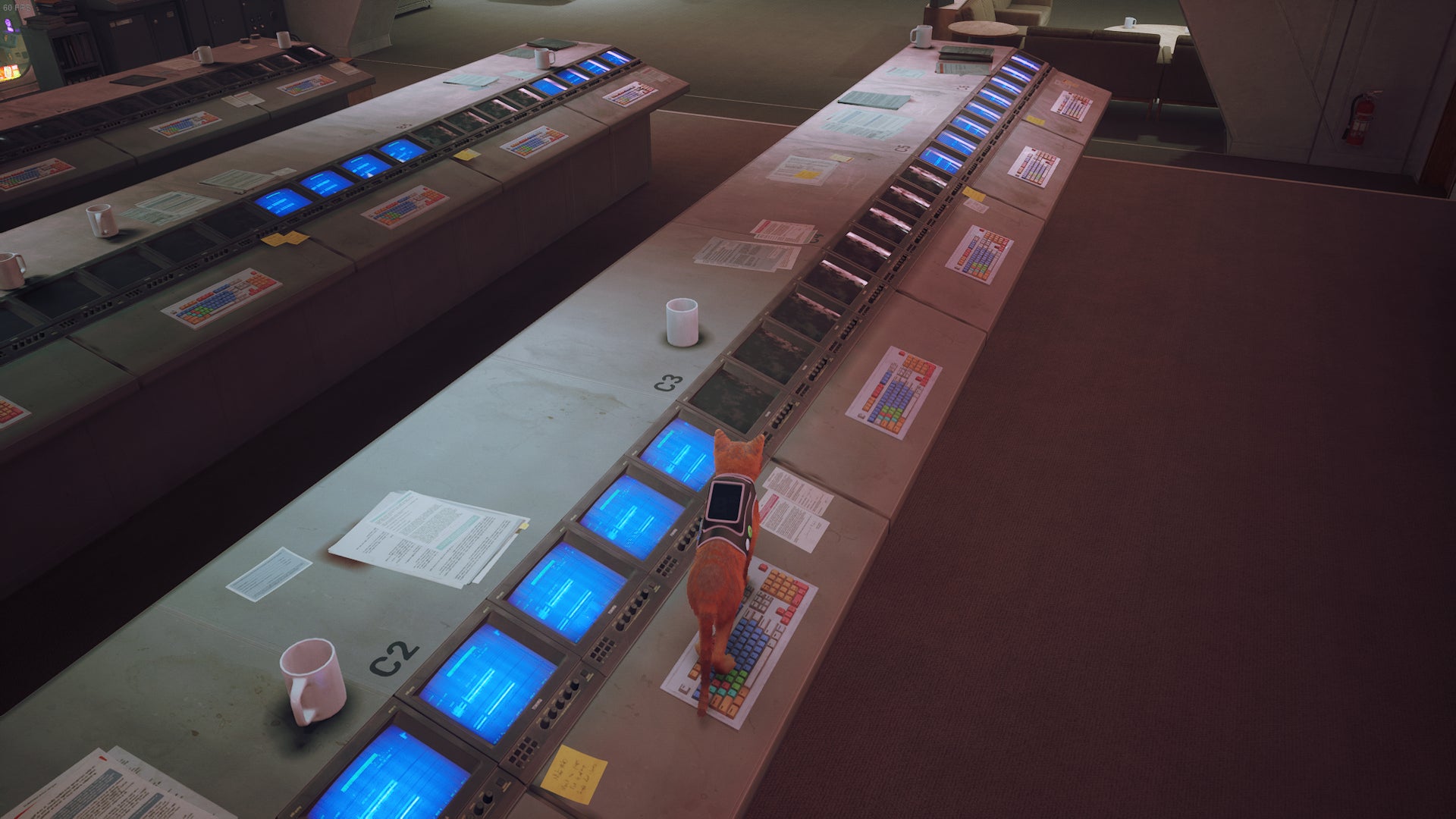 The cat of Stray stands on a keyboard to turn a computer on in the Control Room. - 9