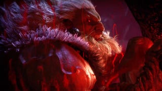 A frame from Street Fighter 6's Akuma teaser trailer showing the character with a shock of white hair in a gloomy red chamber.