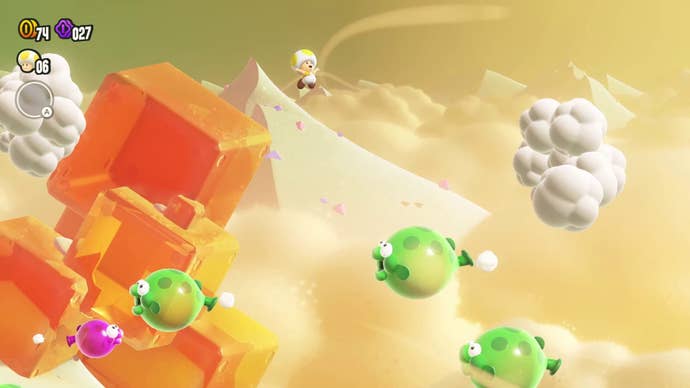 An aerial stage in Super Mario Wonder; a yellow sky, green and purple flying fish, and white clouds.