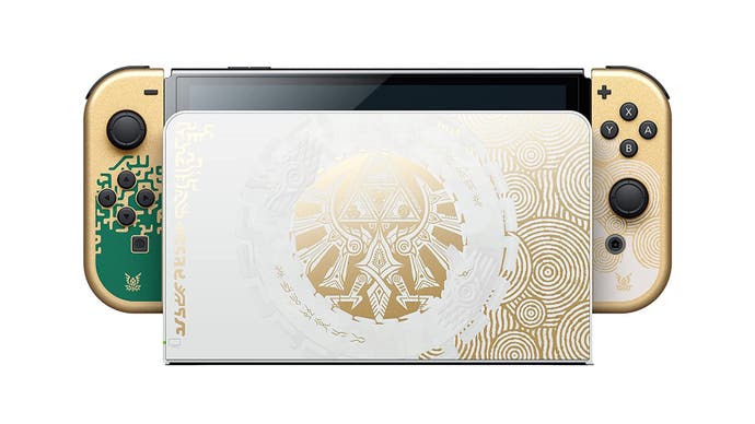 The Legend of Zelda: Tears of the Kingdom edition Switch OLED console in the dock with Joy Cons attached.