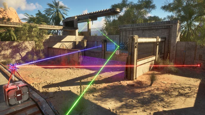 A screenshot from The Talos Principle 2 showing a sandy outdoor puzzle area surrounded by palm trees, with different-coloured lasers reflecting off bits of scenery as the player attempts to find its solution.