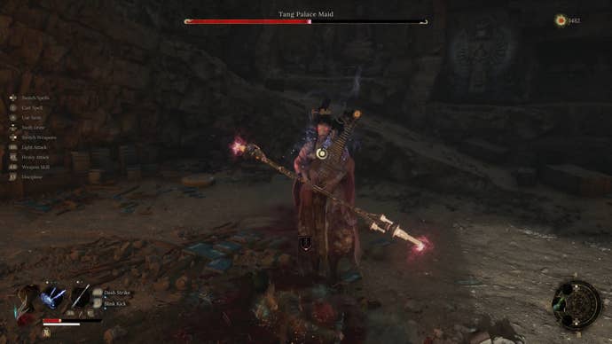 Battling the Tang Palace Maid in Wuchang Fallen Feathers. She is a spectral figure in Ming dynasty attire.