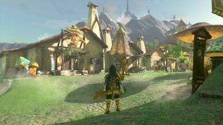 Link standing in Hateno Village in The Legend of Zelda: Tears of the Kingdom.