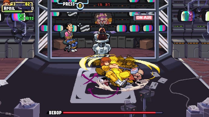 April O’Neil swings her camera around in Teenage Mutant Ninja Turtles: Shredder’s Revenge