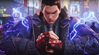 Kazuya in Tekken 8 making a fist, with sparks of energy surrounding him.