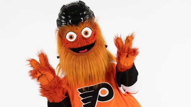 Gritty of the Philadelphia Flyers gives a peace sign. - 3
