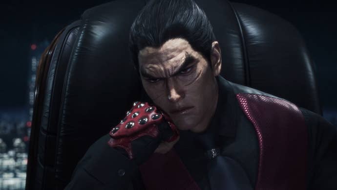 Kazuya leans on his fist, sitting in a big chair and looking tired in his office.