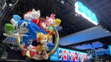 Sega's Tokyo Game Show booth with inflatable Sonic characters.