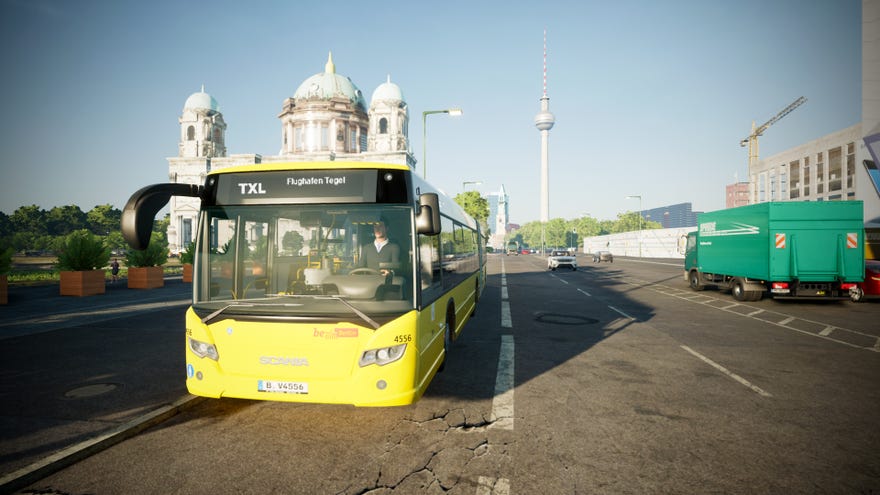 Driving a yellow Scania bus through Berlin in a screenshot of The Bus.
