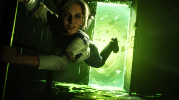 A female character hangs by her fingertips above a glowing green portal.