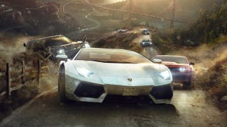 Promotional art for The Crew showing cars racing toward the camera as a rugged landscape stretches out behind them.