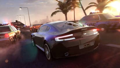 An Aston Martin being chased by constabulary successful The Crew.