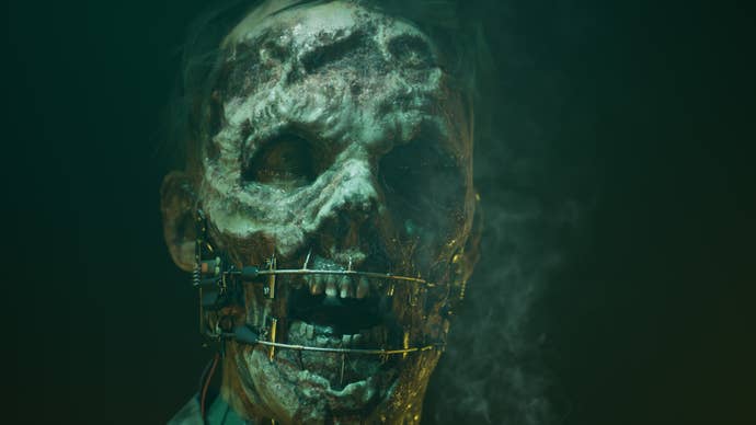 A close-up of the face of a corpse that has been turned into a grisly puppet with the use of wires and electronics in The Dark Pictures Anthology: The Devil In Me.