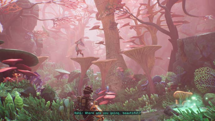 A young woman stands looking up a coral-esque landscape in The Gunk