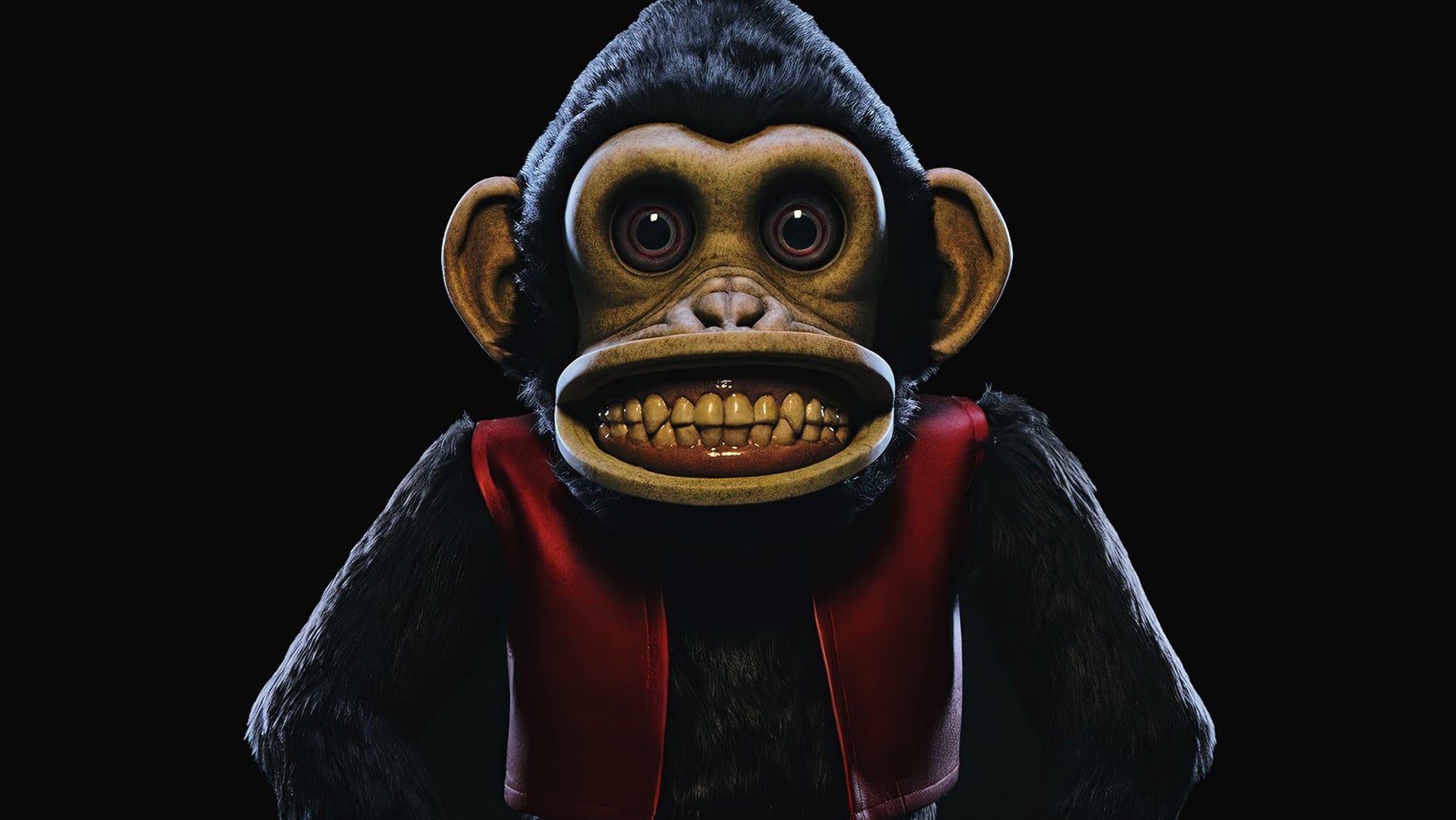 A toy monkey with a big creepy grin on its face from The Monkey. - 1