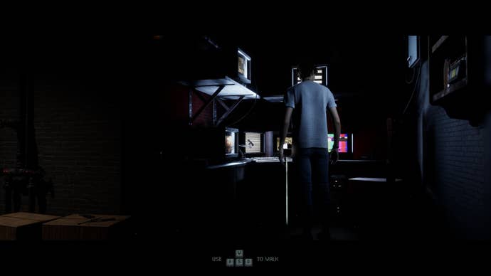 Dylan, one of the camp counsellors from The Quarry, looks at a creepy security camera system