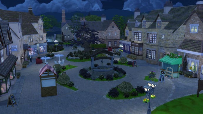 A night time view of the new town in the Sims 4 Cottage Living expansion. It is modelled on idyllic English market towns, like you'd get in Midsomer Murders